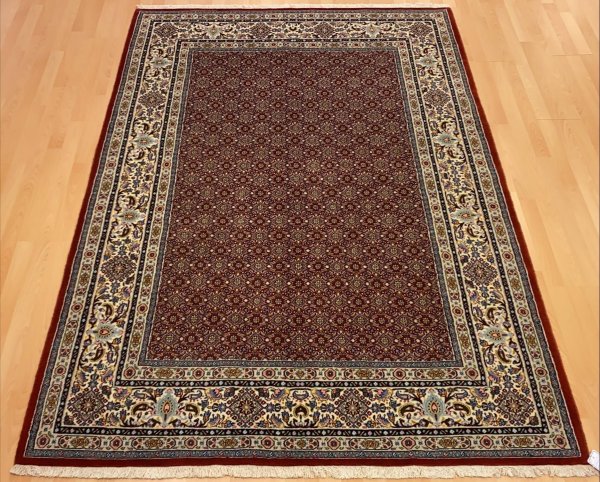 Persisk moud tæppe i rød brune farver
